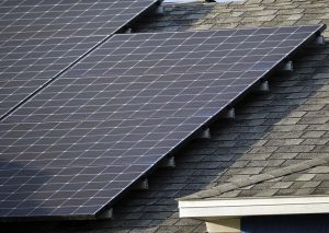 Solar panels on the roof of a family home